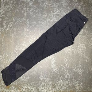 RARE Lululemon leggings with black pattern details.